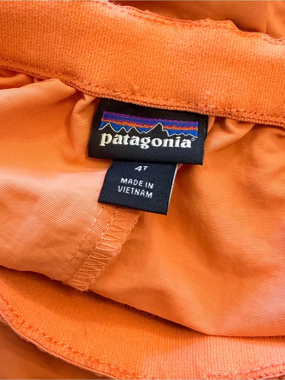 Patagonia Baggies 4” Un-Lined Coral Orange Peel Kids Elastic Waist Shorts